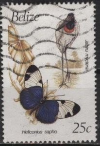 Belize 935 (used) 25c Sapho longwing butterfly & Jabiru stork (1990)