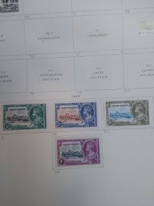 collection on pages Cayman Islands 1900-35 PS: CV $215