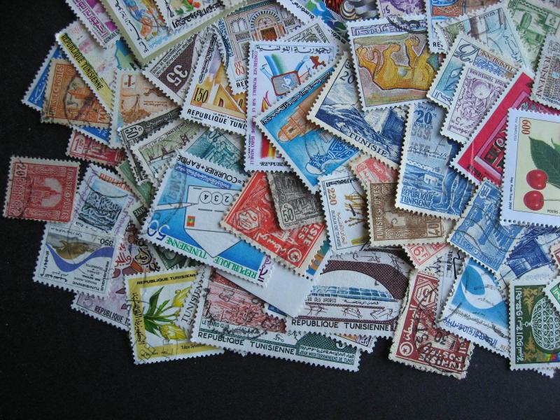 TUNISIA elusive mixture (duplicates, mixed condition) of 100 check them out!