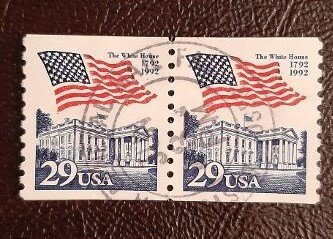 US Scott # 2609; used coil pair 29c Flag over WH from 1992; VF centering
