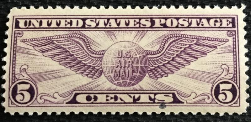 US #C12 MNH Single Winged Globe Ink spot under S SCV $17.50 L21