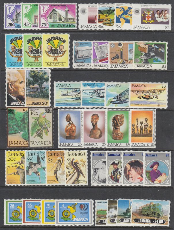 Jamaica Sc 547//611 MLH. 1982-1985 issues, 12 complete sets, VF