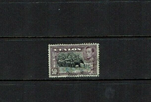 Ceylon: 1938,  50c elephants, perforation 13 x 11.5, SG 394, Used. 