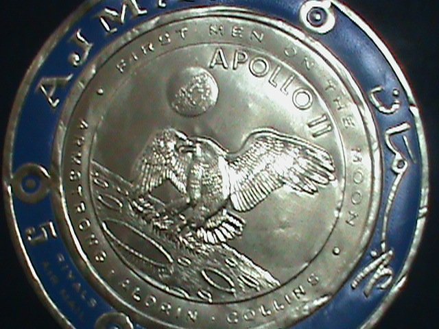 ​AJMAN-AIRMAIL-FIRST MAN ON THE MOON-APOLLO 11-ALUMINIUM REPLICA ROUND STAMP