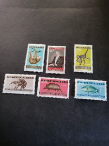 Stamps Columbia Scott #713-5, C357-9 never hinged