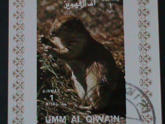 ​UMM AL QIWAIN- LOVELY PROTECTING ANIMAL-CTO IMPERF-S/S VF-FANCY CANCEL