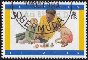 Bermuda 1997 used Sc #747 30c Man, children, blocks Education