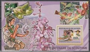 Guinea, 2006 issue. Centenary of Scouting. Boy Scout with Orchids s/sheet. #2.