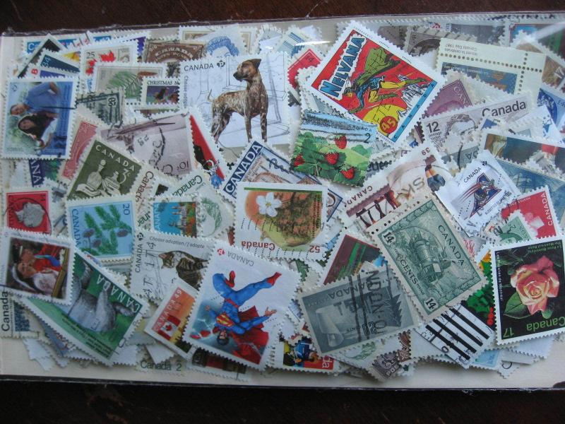 CANADA colossal mixture(duplicates,mixed cond)10,000 old,new,35%comems,65%defins