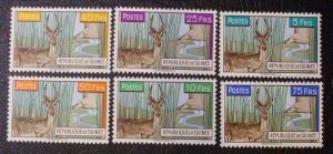 Guinea Scott #214-219 unused