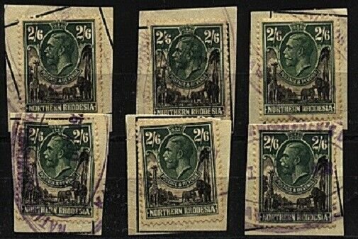 NORTHERN RHODESIA 1925 GV 2/6d SG12 x 6 fiscally used on pieces...........98524