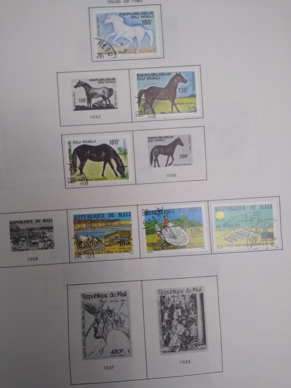 collection on pages Mali 1977-83 scattered most CTO PS: CV $103