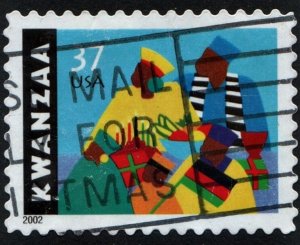 SC#3673 37¢ Kwanzaa Single (2002) Used