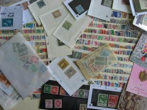 WW boxlot stamps in glassines,sales cards,stock pages,what lurks? Check them out