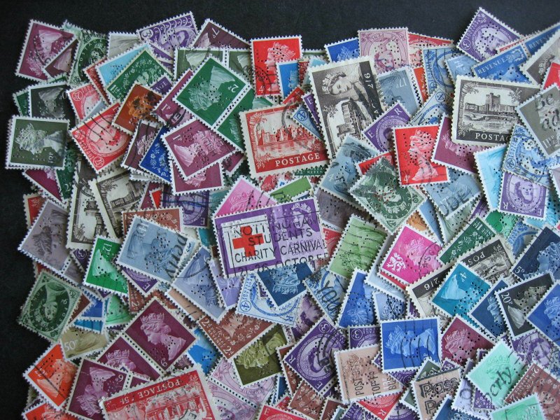 Great Britain 600 perfins QEII era mixture (duplicates, mixed condition) 