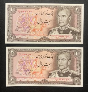 A pair of Uncirculated 20 Rials, VF