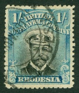 SG 232 Rhodesia 1/- black & greenish-blue. Very fine used CAT £55