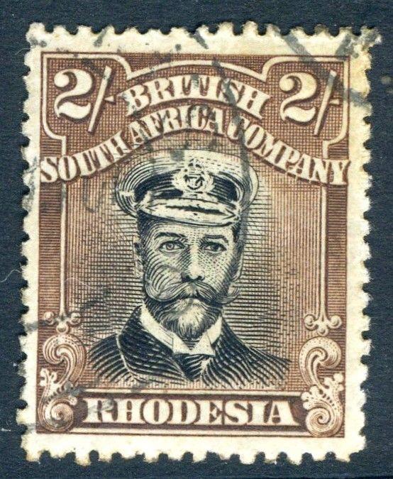 RHODESIA-1922-23 2/- Black & Brown Sg 301 GOOD USED V18564