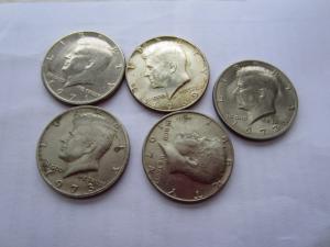 5 kennedy half dollar coins 
