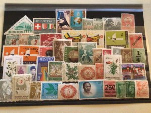 Worldwide mounted mint mixed stamps A9575