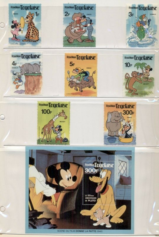 DISNEY STAMPS, 8 DIFFERENT SETS FROM DIFFERENT COUNTRIES IN FOLDERS