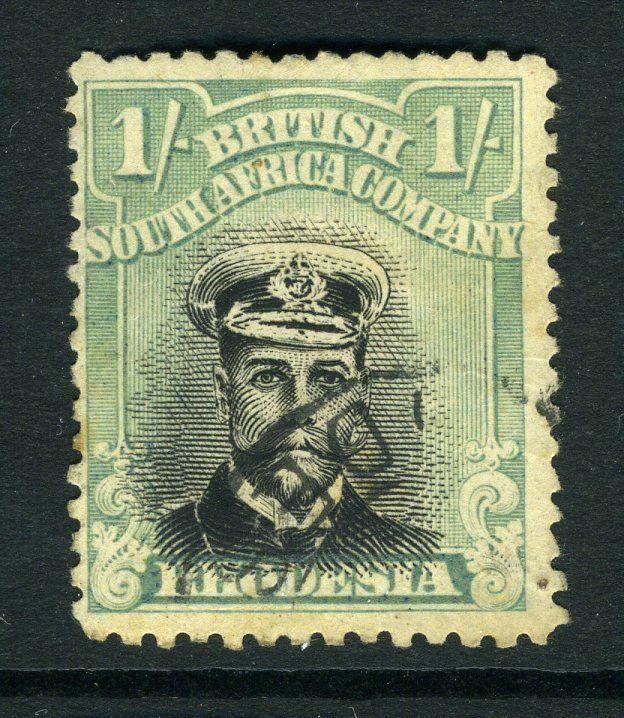 RHODESIA-1913-22 1/-  Black & Pale Blue-Green Perf 14 Sg 272 FINE USED V7746