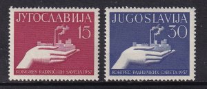 Yugoslavia   #478-479  MNH  1957  hand holding factory