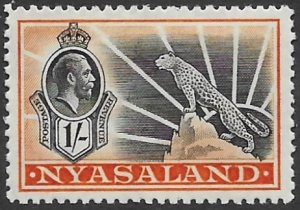 Nyassaland 46  1934  1sh   fvf mint - hinged