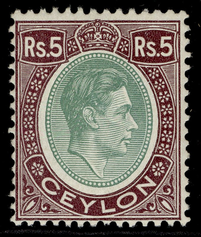 CEYLON GVI SG397, 5r green & purple, LH MINT. Cat £55. CHALKY