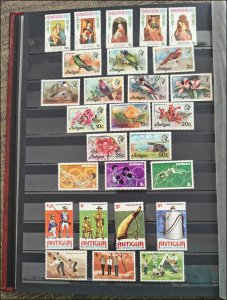 COLLECTION OF ANTIGUA & BARBUDA STAMPS IN A STAMPS STOCK BOOK - ALL DIFFERENT!!!