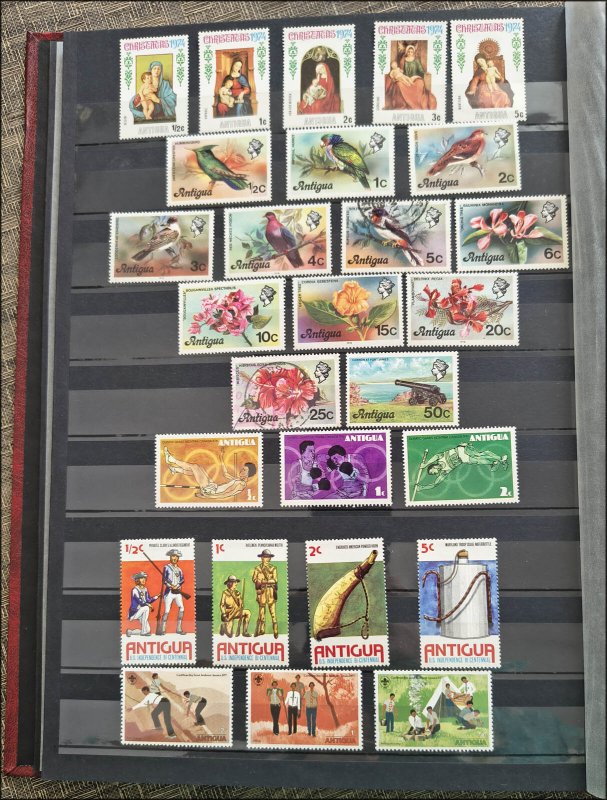 COLLECTION OF ANTIGUA & BARBUDA STAMPS IN A STAMPS STOCK BOOK - ALL DIFFERENT!!!