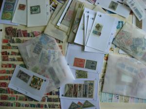 WW boxlot stamps in glassines,sales cards,stock pages,what lurks? Check them out