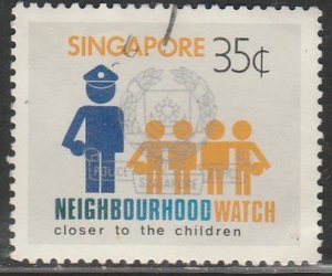SINGAPORE 421, NEIGHBORHOOD WATCH 35¢ USED, VF. (309)