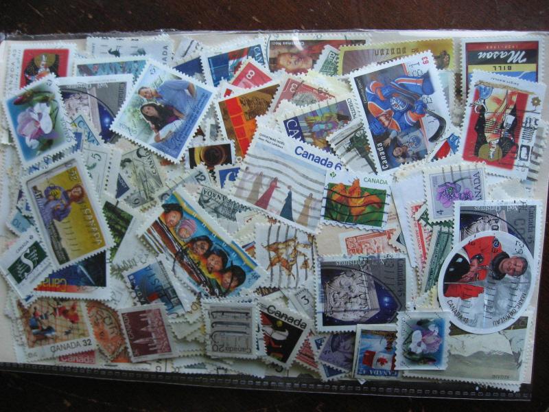 CANADA colossal mixture(duplicates,mixed cond)10,000 old,new,35%comems,65%defins