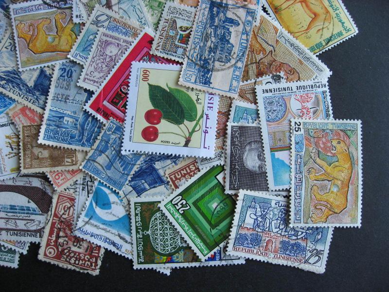 TUNISIA elusive mixture (duplicates, mixed condition) of 100 check them out!