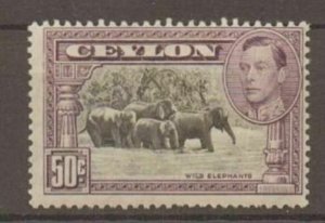 CEYLON SG394a 1938 50c BLACK & MAUVE p13x13 MTD MINT OFF-CENTRE