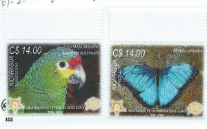 Nicaragua #2467A-B Parrot & Moth( M) CV $5.00