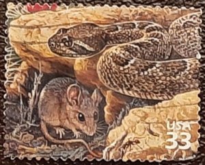 US Scott # 3293i; used 33c rattlesnake from 1999; VF centering; off paper