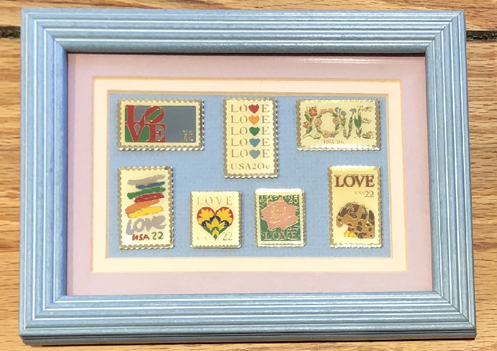 7 Love Stamp Pins Under Glass in a Wood Frame Specialty Philately