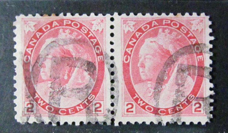 Canada #77 Pair with a nice reentry.Used.