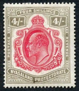 Nyasaland SG79 KEVII 4/- carmine and black M/M Cat 140 pounds