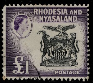 RHODESIA & NYASALAND QEII SG31, £1 black & deep violet, USED. Cat £65.