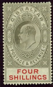 GIBRALTAR-1910 4/- Black & Carmine.  A lightly mounted mint example Sg 73