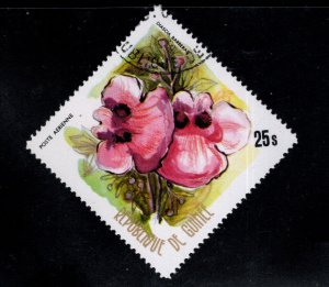 Guinea Scott C128 Flower stamp favor canceled on various corners