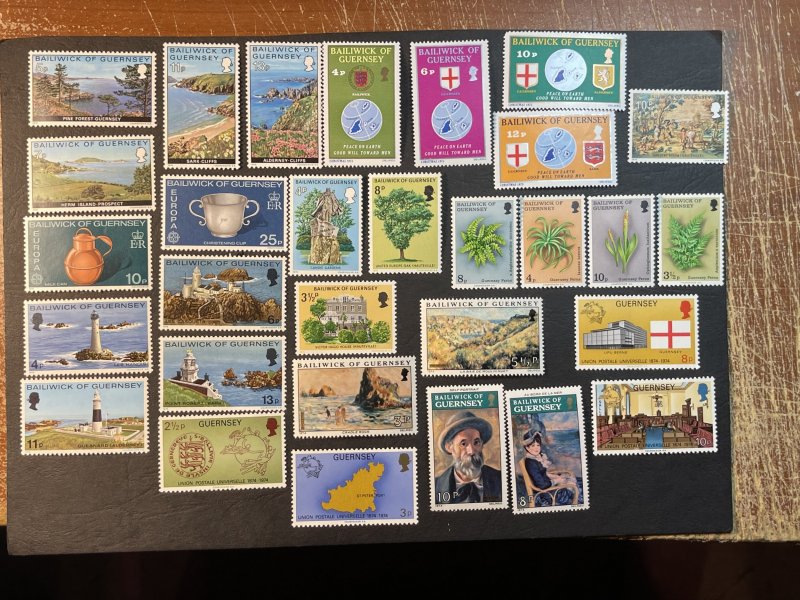 GUERNSEY # 111-140-MINT NEVER/HINGED--8 COMPLETE SETS--1974-76