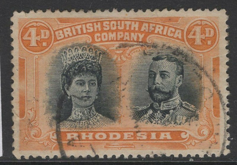 RHODESIA SG138 1910-3 4d GREENISH BLACK & ORANGE FINE USED