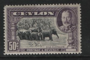 CEYLON 273  MINT HINGED, SOME CRACKED GUM KING GEORGE AND ELEPHANTS