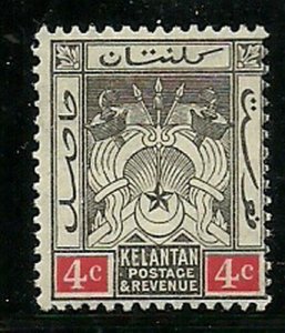 Album Treasures Malaya Kelantan Scott # 19  4c Symbols of Government MH