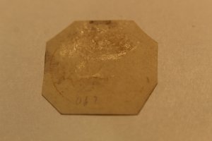 US U67  CUT SQUARE UNUSED  DIAGONALLY CUT CORNERS