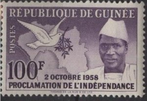 Guinea 174 (mnh) 100fr Pres. Touré, map, dove, vio (1959)